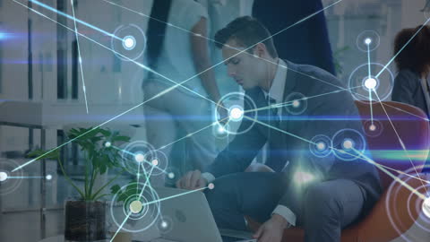 Businessman Engaging with Digital Networking in Modern Office