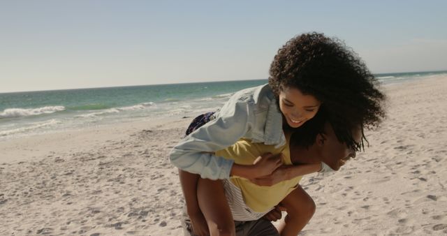 Happy Couple Having Fun on Sandy Beach - Download Free Stock Images Pikwizard.com