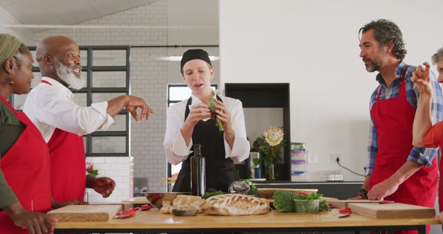 Chef Teaching Diverse Cooking Class in Modern Kitchen - Download Free Stock Images Pikwizard.com