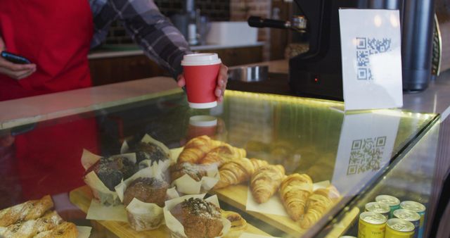 Barista Serving Coffee and Pastries in a Cozy Coffee Shop - Download Free Stock Images Pikwizard.com