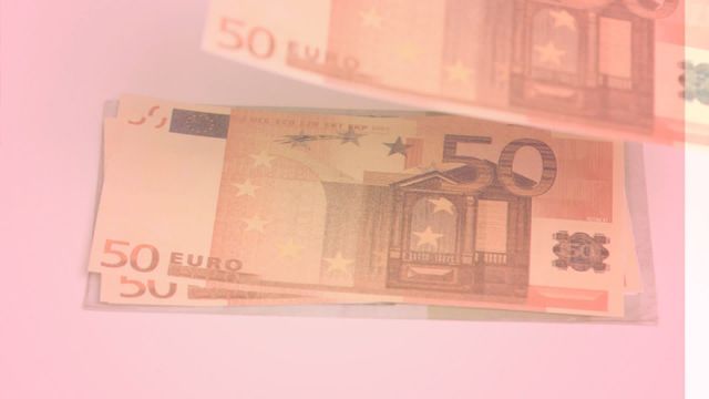 Visual captures euro bills seemingly floating with a soft, soothing pink backdrop. Vibrant scene perfect for concepts of finance, economy, or futuristic currency transactions. Useful for business presentations, budgeting apps, or financial service promotions highlighting modern, comfortable approach to money handling.