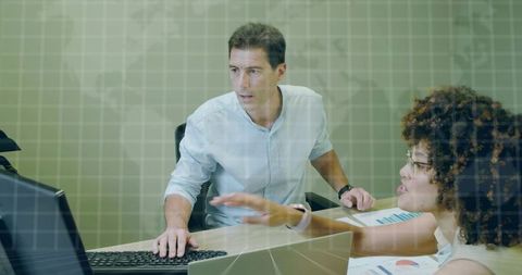 Business Team Analyzing Data with Charts and Computer