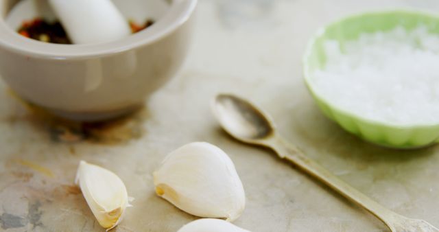 Mortar and Pestle with Garlic and Salt in Kitchen - Download Free Stock Images Pikwizard.com