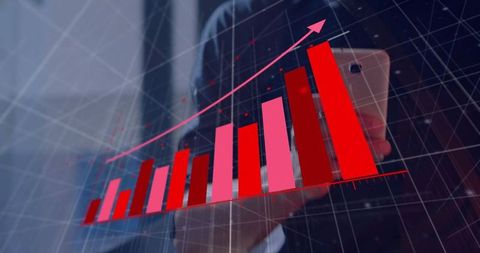 Businessman analyzing financial growth with 3d bar chart