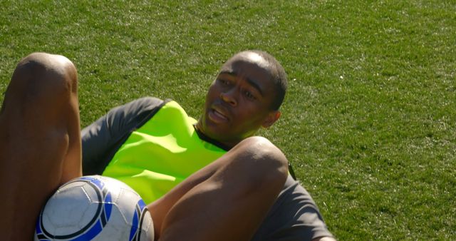 Football Player Training on Grass Field - Download Free Stock Images Pikwizard.com