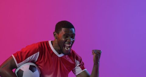 Joyful African American Soccer Player Celebrating Victory