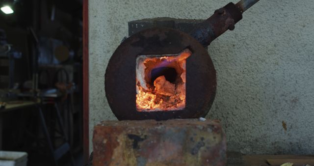 Small Industrial Furnace with Glowing Heat in Workshop - Download Free Stock Images Pikwizard.com