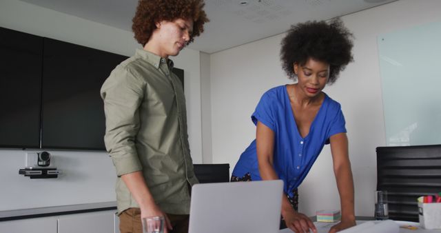 Diverse Business Team Discussing Technical Drawing in Modern Office - Download Free Stock Images Pikwizard.com