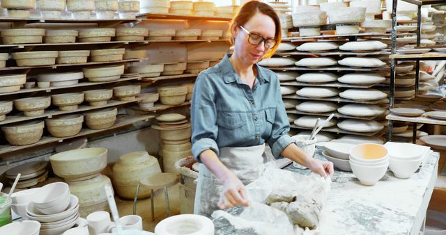 Female Pottery Artist Working with Clay in Artisan Workshop - Download Free Stock Images Pikwizard.com