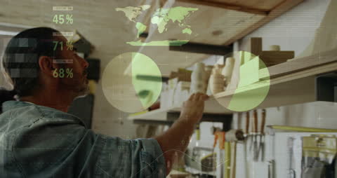 Craftsman Analyzing Ceramic Art Using Holographic Data Projections