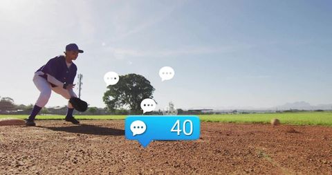 Determined Teenage Baseball Player Fielding on Sunlit Infield