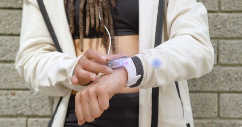 active woman using smartwatch for fitness tracking - Download Free Stock Images Pikwizard.com