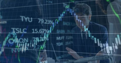 Business team analyzing stock market candlestick charts during boardroom strategy meeting
