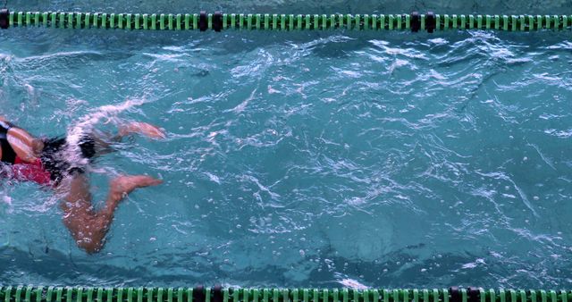 Competitive Swimmer Practicing in Pool - Download Free Stock Images Pikwizard.com