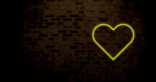 Yellow Neon Heart Glowing on Brick Wall at Night - Download Free Stock Images Pikwizard.com