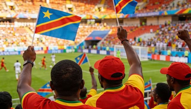 Dr congo football fans cheering and waving flags in vibrant stadium crowd during match