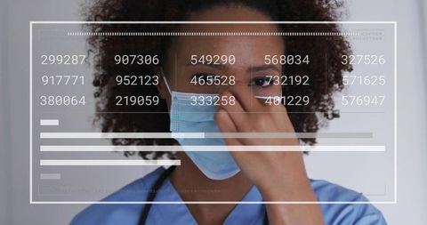 African American Nurse Adjusting Mask with Data Overlay in Clinic