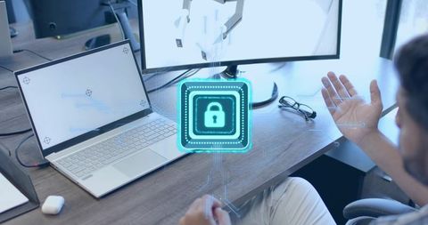 Cybersecurity expert interacting with holographic security icon
