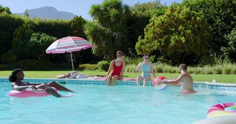 Diverse Friends Enjoying Summer Poolside Activities