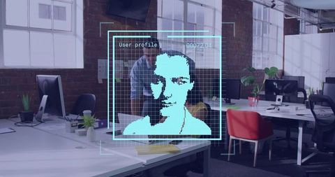 Projecting holographic facial profile over laptop in modern open-plan office workspace