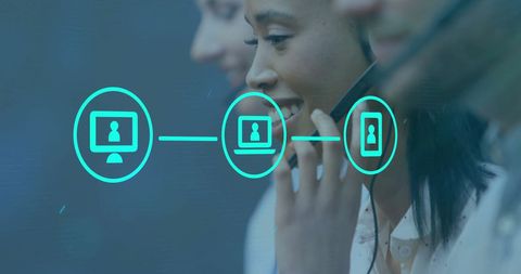 Diverse Professionals Collaborating with Digital Technology Symbols