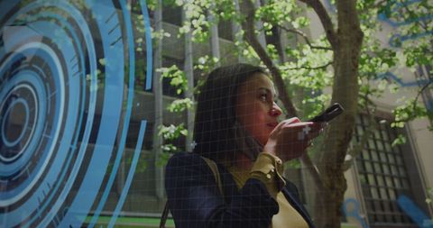 Woman using voice command technology in urban environment with digital overlay