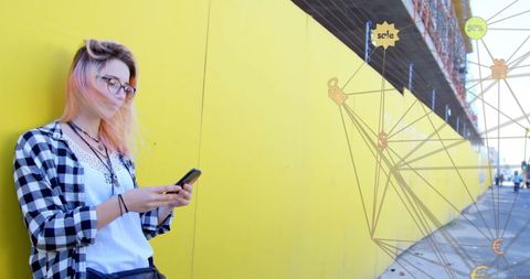 Trendy Young Woman Engaging with Social Media on Smartphone