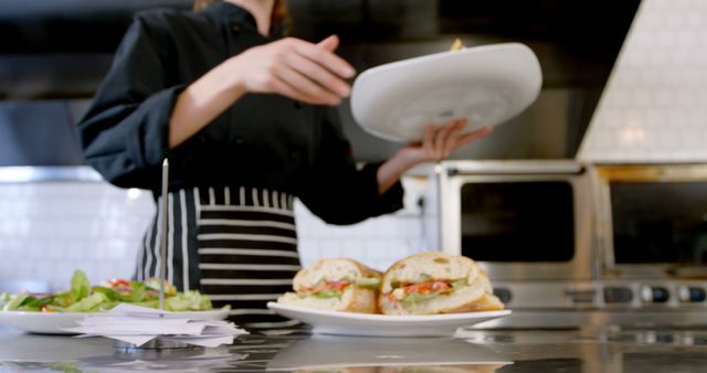 Chef Preparing Sandwiches in a Professional Kitchen - Download Free Stock Images Pikwizard.com