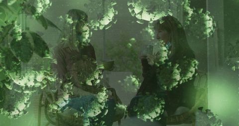 Mother and daughter coffee chat with virus awareness overlay