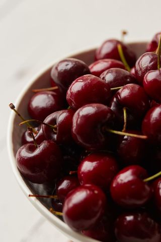 Glossy Fresh Cherries in Ceramic Bowl Close-Up Rich Red Summer Fruit