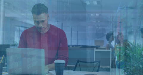 Focused Business Professional Analyzing Data in Modern Office