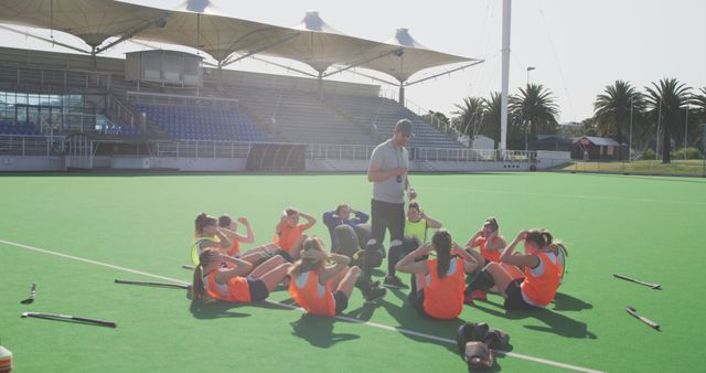 Field Hockey Coach Giving Team Instructions During Training - Download Free Stock Images Pikwizard.com