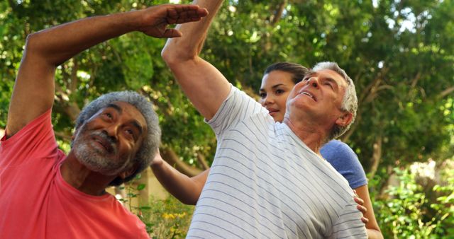 Senior Men Practicing Yoga and Stretching Outdoors with Instructor - Download Free Stock Images Pikwizard.com