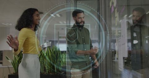 Diverse Team Collaborating in Cybersecurity Office Environment