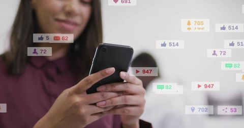 Woman Engaging with Social Media Metrics via Smartphone