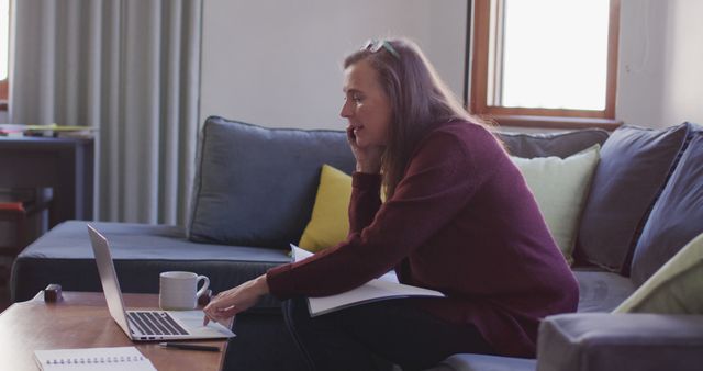 Woman Working from Home on Laptop While on Phone - Download Free Stock Images Pikwizard.com