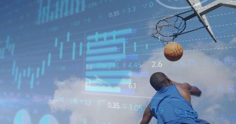Leaping basketball player dunking at outdoor hoop with data analytics overlays, motion