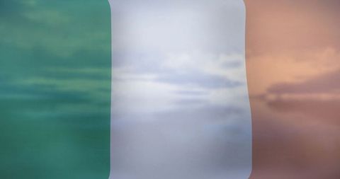 Billowing tricolor flag on cloudy day in freedom outdoors concept