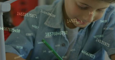 Young Boy Writing Surrounded by Digital Numbers