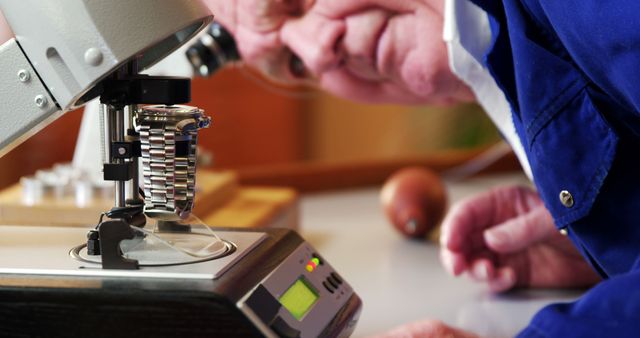 Senior Watchmaker Inspecting Mechanical Wristwatch Under Microscope - Download Free Stock Images Pikwizard.com