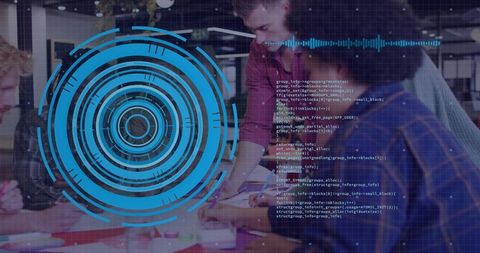 Collaborating Professionals Exploring Tech and Data Analysis