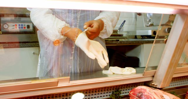 Ensuring Hygiene with Gloved Hands in Food Preparation Area - Download Free Stock Images Pikwizard.com