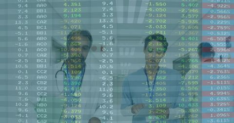 Healthcare professionals analyzing financial data overlay in hospital