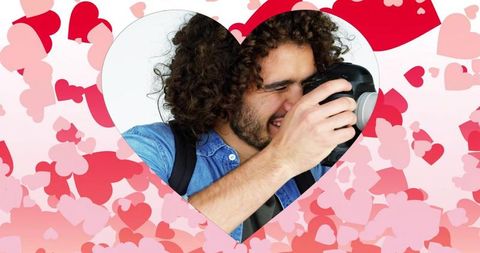 Photographer in heart cutout expressing creativity and passion