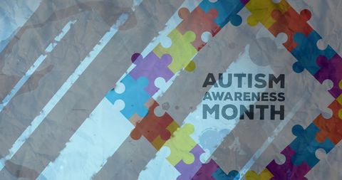Colorful autism awareness month with puzzle pieces design