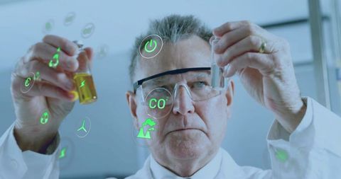 Senior scientist comparing chemical vials with holographic green energy icons and CO2 analytics