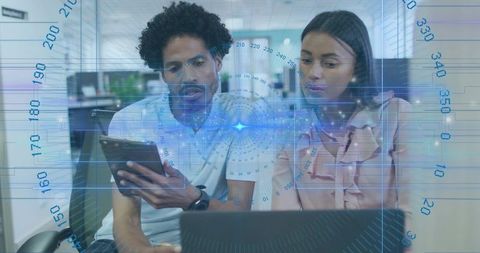 Business team collaborating on tablet and laptop with futuristic data visualization hud