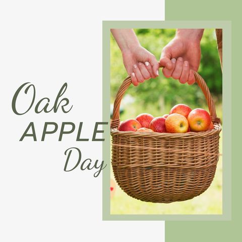 Couple holding wicker basket filled with fresh apples