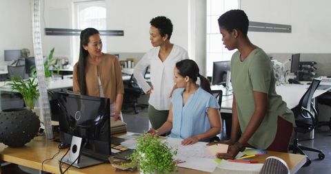 Team of Diverse Businesswomen Collaborating in Modern Office