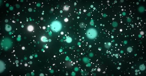 Abstract green and white light spots on dark background